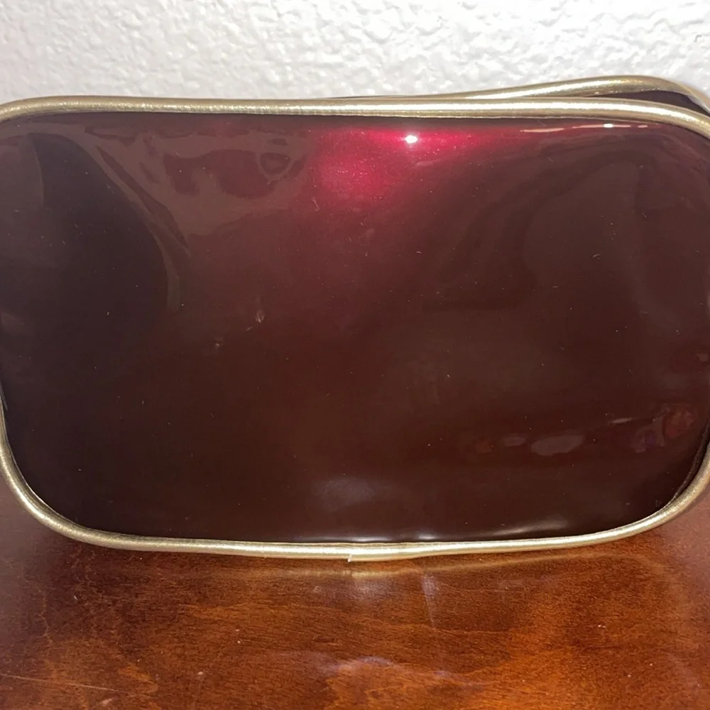 Avon Irridescent Burgundy PVC Make Up Bag Wristlet Gold Trim 2003 NOS